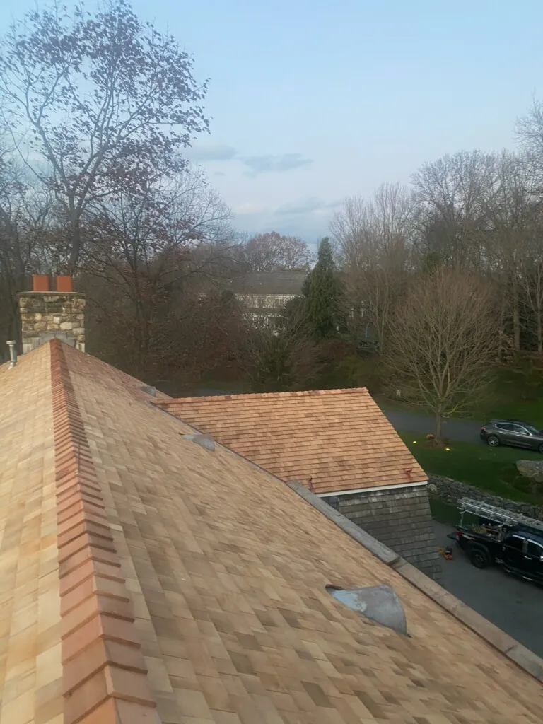 Cedar shake ridge cap detail on a Darien CT roof